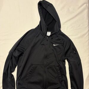 Nike Therma-Fit full-zip Fitness top in black polyester material